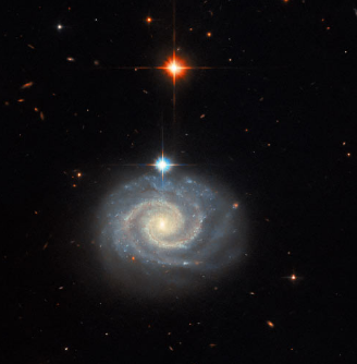 哈勃太空望远镜拍摄到活跃螺旋星系的美丽图像